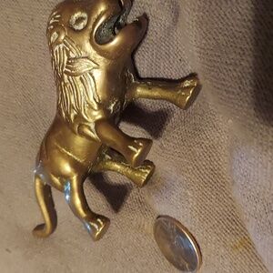 Whimsical brass lion statue